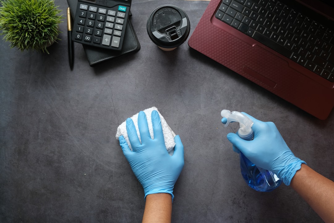 hero-img person-in-blue-long-sleeve-shirt-sitting-beside-black-laptop-computer-9gpkrsbgmc